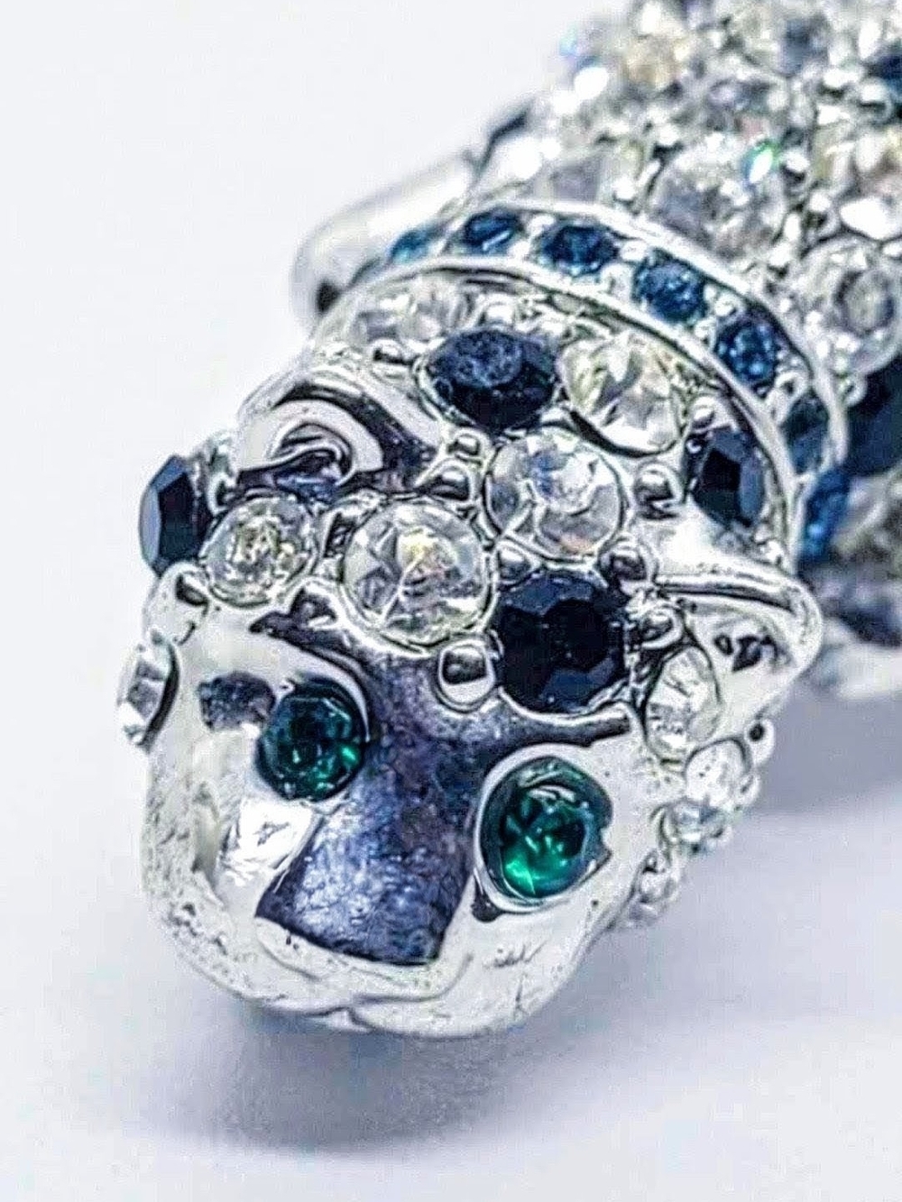 Crystal-Embellished Silver Leopard Pendant with Emerald Eyes